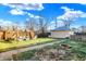 Spacious backyard with detached garage, fire pit, and outdoor furniture at 2335 Union St, Indianapolis, IN 46225