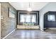 Living room with wood-paneled accent wall, built-in seating, and ample natural light at 2335 Union St, Indianapolis, IN 46225
