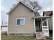 Charming two-story home with a covered front porch and updated siding at 416 N Mulberry St, Muncie, IN 47305