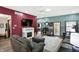 Living room boasts hardwood floors, fireplace and two-toned walls at 4725 W Harrisburg Ct, New Palestine, IN 46163