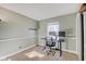 Home office with a desk, chair, and neutral color palette at 5772 Gallagher Dr, Greenwood, IN 46142