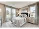 Cozy bedroom with large windows, carpeted floors, and stylish furnishings at 67 Sterling Pl, New Whiteland, IN 46184
