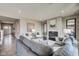 Inviting living room with a fireplace, plush seating, and stylish decor at 67 Sterling Pl, New Whiteland, IN 46184