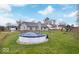 Spacious backyard featuring a covered above-ground pool and a playset at 7360 Southern Lakes Dr, Indianapolis, IN 46237