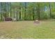 Spacious backyard with a fire pit, perfect for outdoor entertaining at 7701 Center Lake Rd, Nineveh, IN 46164
