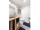 Basement bathroom with a live-edge wood vanity, vessel sink, and rustic decor at 7701 Center Lake Rd, Nineveh, IN 46164