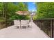 Deck with outdoor dining table, umbrella, and scenic view at 7701 Center Lake Rd, Nineveh, IN 46164