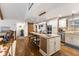 Stylish kitchen featuring granite countertops, bar seating, and stainless steel appliances at 7701 Center Lake Rd, Nineveh, IN 46164