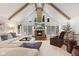 Living room with vaulted ceilings, stone fireplace, and comfortable seating at 7701 Center Lake Rd, Nineveh, IN 46164