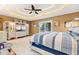 Spacious main bedroom with a tray ceiling, built-in entertainment center and plush carpet at 7701 Center Lake Rd, Nineveh, IN 46164