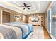 Spacious main bedroom with a tray ceiling, plush carpet and a built-in entertainment center at 7701 Center Lake Rd, Nineveh, IN 46164