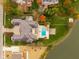 Aerial view of home with pool and backyard, located on lakefront property at 8804 Waterside Dr, Indianapolis, IN 46278