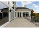 Luxury balcony with a stone floor and wrought iron railing, offering a stunning lake view at 8804 Waterside Dr, Indianapolis, IN 46278