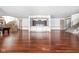 Basement bar with dark wood cabinets and a white countertop at 8804 Waterside Dr, Indianapolis, IN 46278