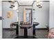 Elegant bathroom with black sinks and mirrored walls at 8804 Waterside Dr, Indianapolis, IN 46278