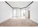 Large bedroom with neutral carpeting and bay windows at 8804 Waterside Dr, Indianapolis, IN 46278