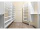 Spacious closet with built-in shelves and hanging rods at 8804 Waterside Dr, Indianapolis, IN 46278