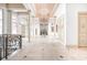 Grand two-story entry with columns, elegant chandelier, and marble floors at 8804 Waterside Dr, Indianapolis, IN 46278