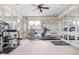 Home gym with various equipment and mirrored walls at 8804 Waterside Dr, Indianapolis, IN 46278