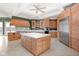 Eat-in kitchen with a large island, custom cabinetry, and stainless steel appliances at 8804 Waterside Dr, Indianapolis, IN 46278