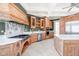 Kitchen features custom cabinetry, stainless steel appliances, and a large island at 8804 Waterside Dr, Indianapolis, IN 46278