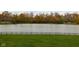 Serene lake view from the property, with lush autumn foliage at 8804 Waterside Dr, Indianapolis, IN 46278