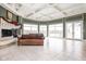 Spacious living area with fireplace and stunning views from large windows at 8804 Waterside Dr, Indianapolis, IN 46278