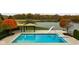 Inviting in-ground pool with slide and spa, lake view at 8804 Waterside Dr, Indianapolis, IN 46278