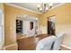 Dining room with textured walls, arched doorway, and view into adjacent room at 1140 Scarlet Quarry Cir, Avon, IN 46123