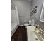 Bathroom with a bathtub, toilet, and vanity with a sink at 2039 Round Barn Ct, Anderson, IN 46017