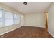 Living room with wood-look floors and door at 3149 Manor Ct, Indianapolis, IN 46218