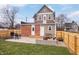 Concrete patio with seating area and wood-burning fire pit at 321 N State St, Greenfield, IN 46140