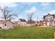 Spacious backyard with shed, patio, and wooden fence at 321 N State St, Greenfield, IN 46140