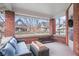 Spacious covered porch with seating area and view of the street at 321 N State St, Greenfield, IN 46140