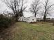 Large backyard with trees and shed at 3919 E 34Th St, Indianapolis, IN 46218