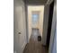 Clean bathroom with a tub and shower, and updated flooring at 3919 E 34Th St, Indianapolis, IN 46218