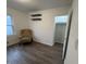 Bright bedroom with large closet and wood-look flooring at 3919 E 34Th St, Indianapolis, IN 46218