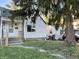 White house with yard and tree at 3919 E 34Th St, Indianapolis, IN 46218