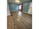 Spacious living room with wood floors at 3919 E 34Th St, Indianapolis, IN 46218