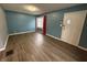 Living room showcasing hardwood floors and a view to the entryway at 3919 E 34Th St, Indianapolis, IN 46218