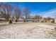 Snowy backyard with view of homes at 610 Atlas Dr, Lebanon, IN 46052