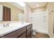 Bathroom with shower, double vanity, and toilet at 610 Atlas Dr, Lebanon, IN 46052