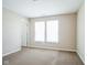 Bright bedroom with two windows and carpet at 610 Atlas Dr, Lebanon, IN 46052