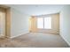 Bedroom with carpet, two windows, and closet at 610 Atlas Dr, Lebanon, IN 46052