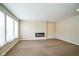 Spacious living room with carpet flooring and electric fireplace at 610 Atlas Dr, Lebanon, IN 46052
