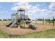 Community playground with slides, swings, and climbing structures at 68 Sterling Pl, New Whiteland, IN 46184