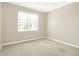 Empty bedroom with neutral walls and carpeted flooring at 7755 Rolling Green Dr, Plainfield, IN 46168