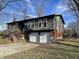 View of the home's exterior, highlighting the attached two-car garage at 791 Shady Creek Dr, Greenwood, IN 46142