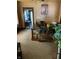 Dining room featuring a table with chairs, carpet, and a view to another room at 802 N Oakland Ave, Indianapolis, IN 46201