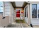 Inviting entryway with a red door and stone detailing at 1036 Laurelwood Ln, Greenwood, IN 46142